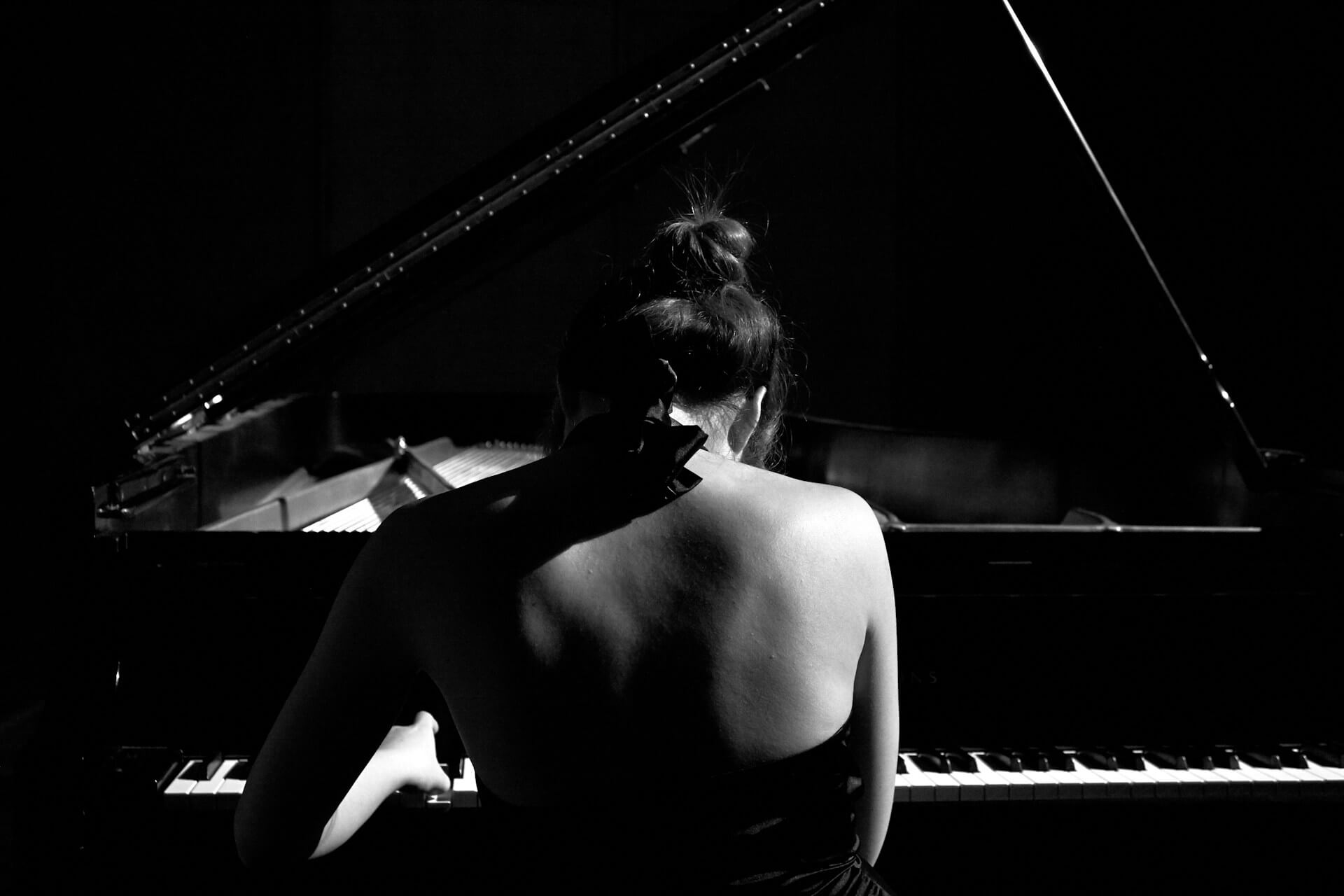 Black and white image of a pianist.